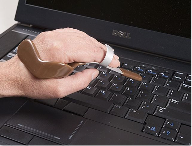 Assistive typing tool on laptop keyboard